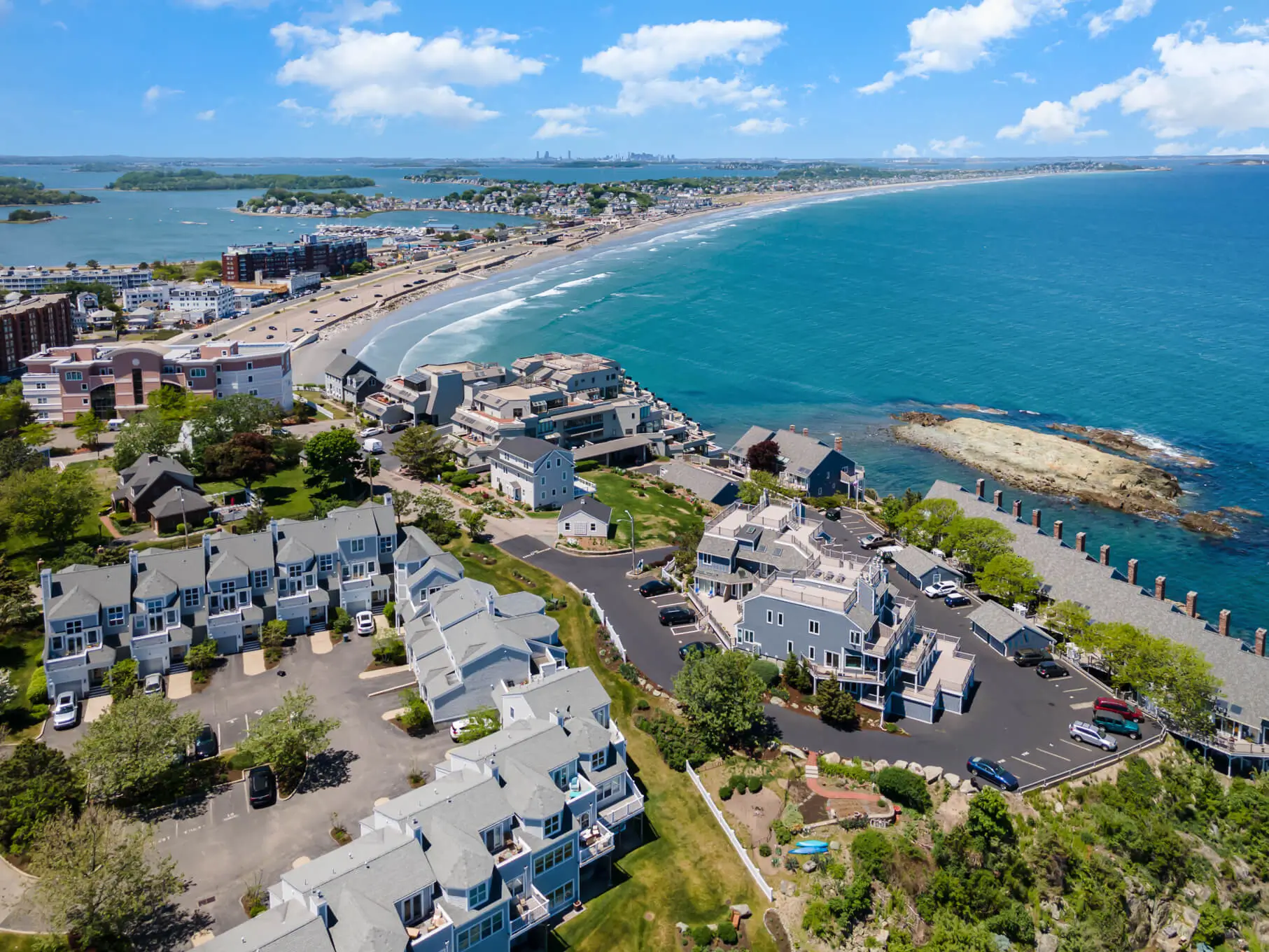 Aerial drone view of Massachusetts property by SkyView Boston showing home and landscaped surroundings
